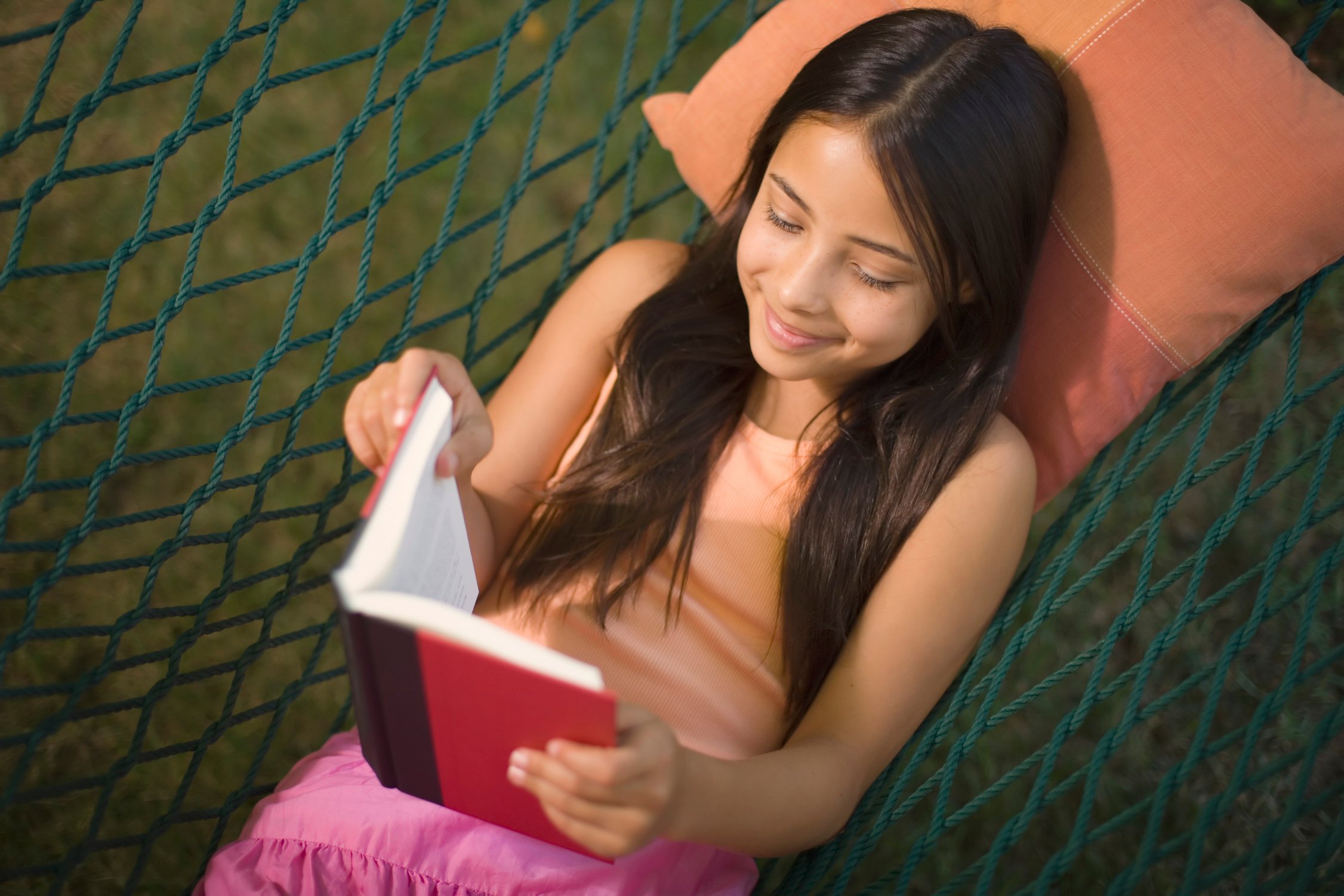 Pre-teen girl reading